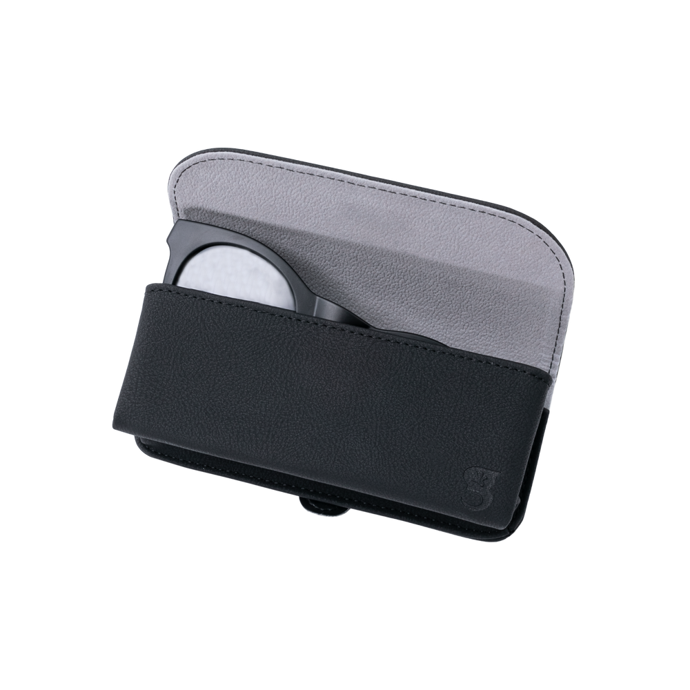 Black faux leather sunglasses case revealing inside texture and sunglasses geckobrands