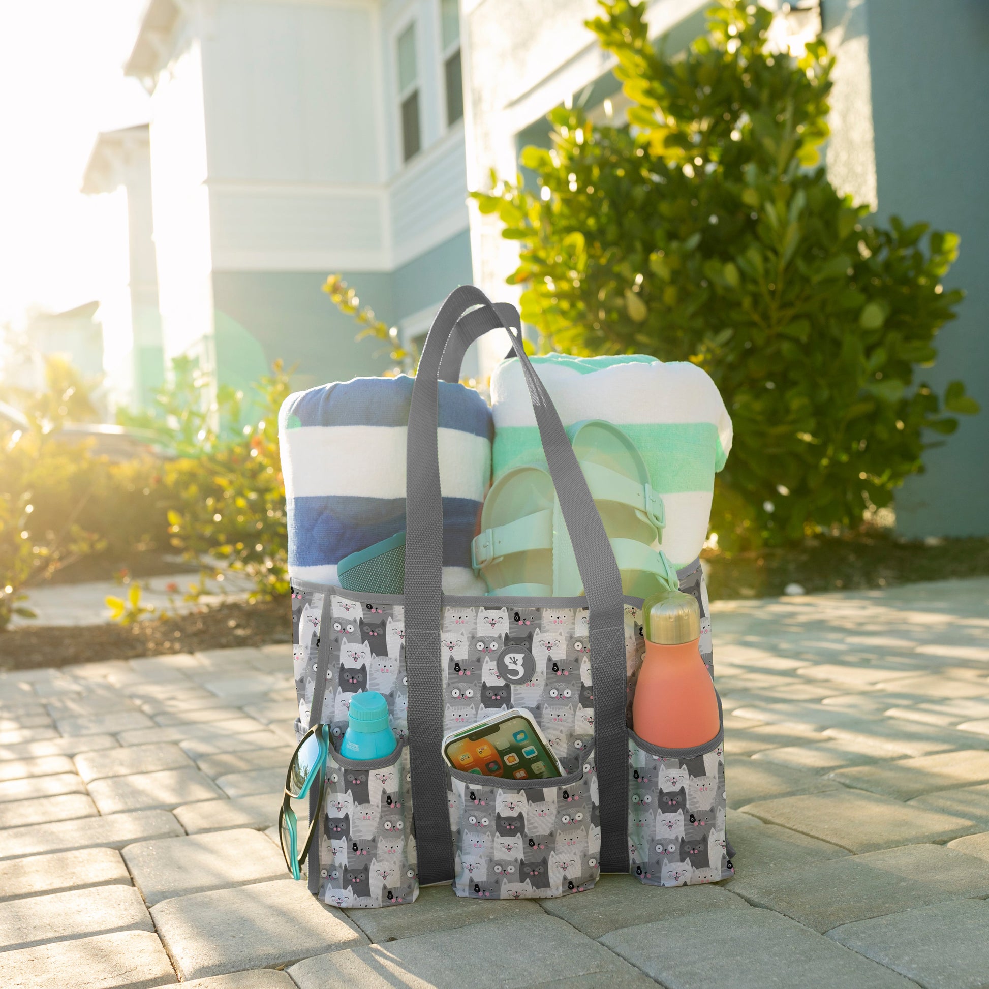 Multicolored bag with a pattern on a stone pathway