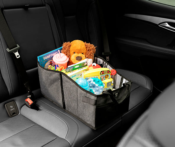 Car organizer with toys and items on a car seat