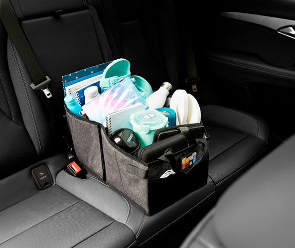 Car organizer with supplies on a car seat