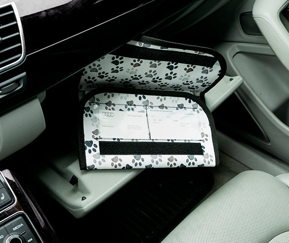 Paws printed fabric organizer inside car glove compartment open to display two ID card windows geckobrands